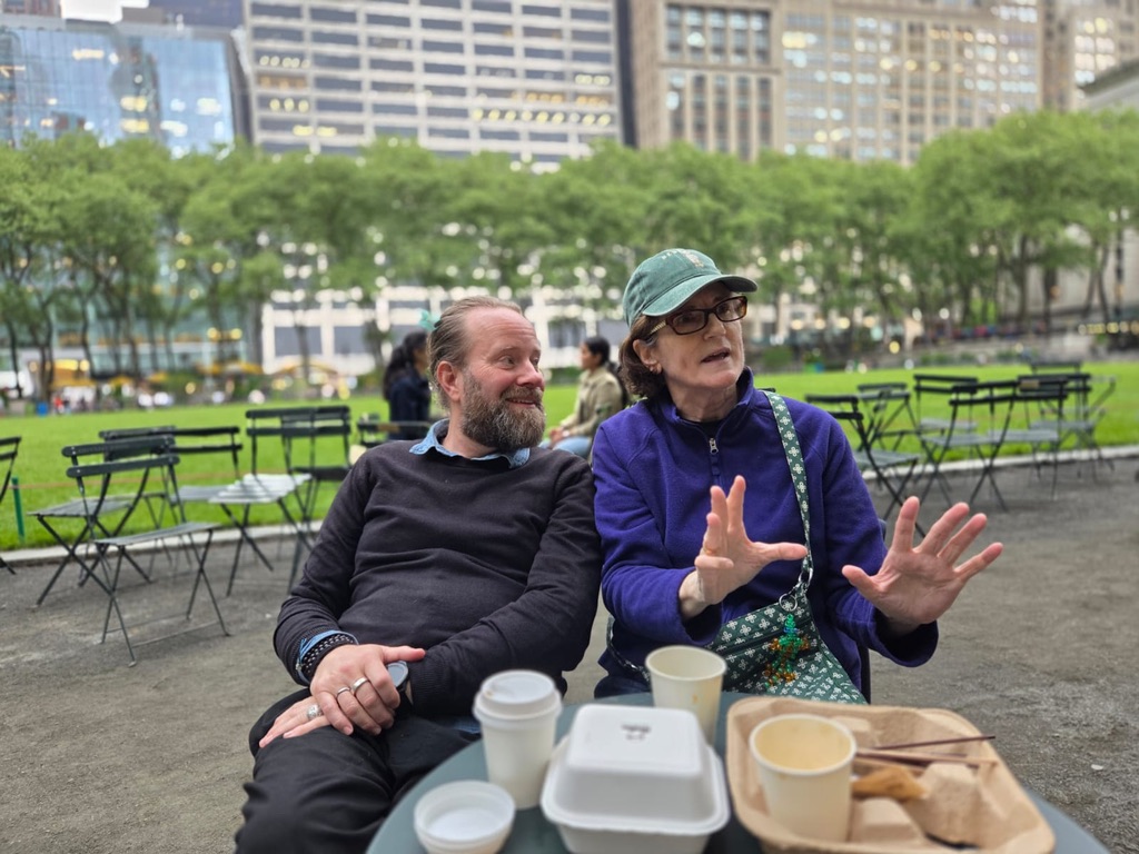 Perry in conversation in a city park, the human mycelium in action