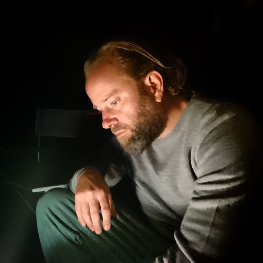 Perry in low light at night